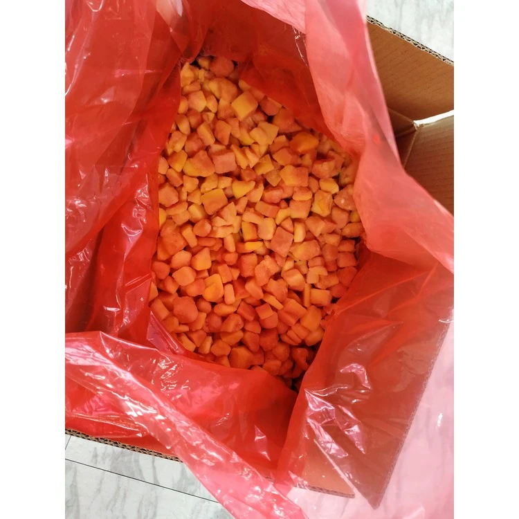 Frozen papaya dice in a lined carton